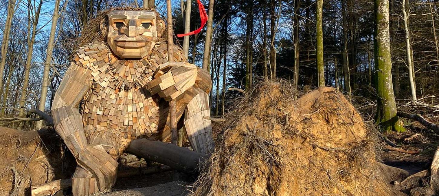 A hidden troll in recycled material by the artist Thomas Dambo