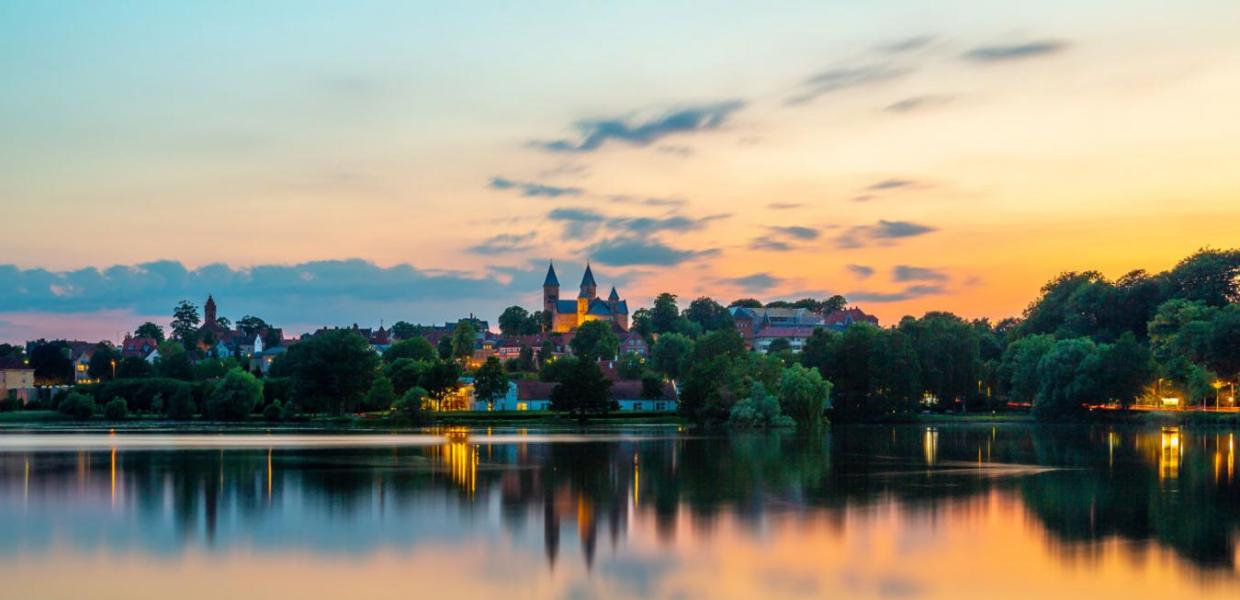 The lake and Viborg Cathedral at night