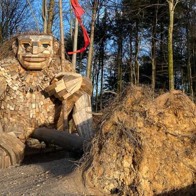 A hidden troll in recycled material by the artist Thomas Dambo