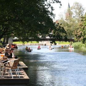 Cosiness at a café along the Gudenå River in the Lake District